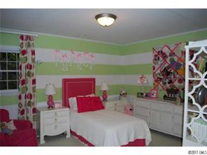 1146 Andover Road Charlotte, NC 28211 - Photo 12 of 13 a bedroom with a bed and a room