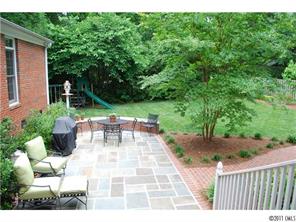 1146 Andover Road Charlotte, NC 28211 - Photo 3 of 13 a view of a patio with a table and chairs