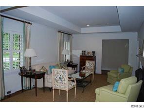 1146 Andover Road Charlotte, NC 28211 - Photo 8 of 13 a living room with furniture and a lamp
