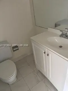 a close view of a toilet in a bathroom