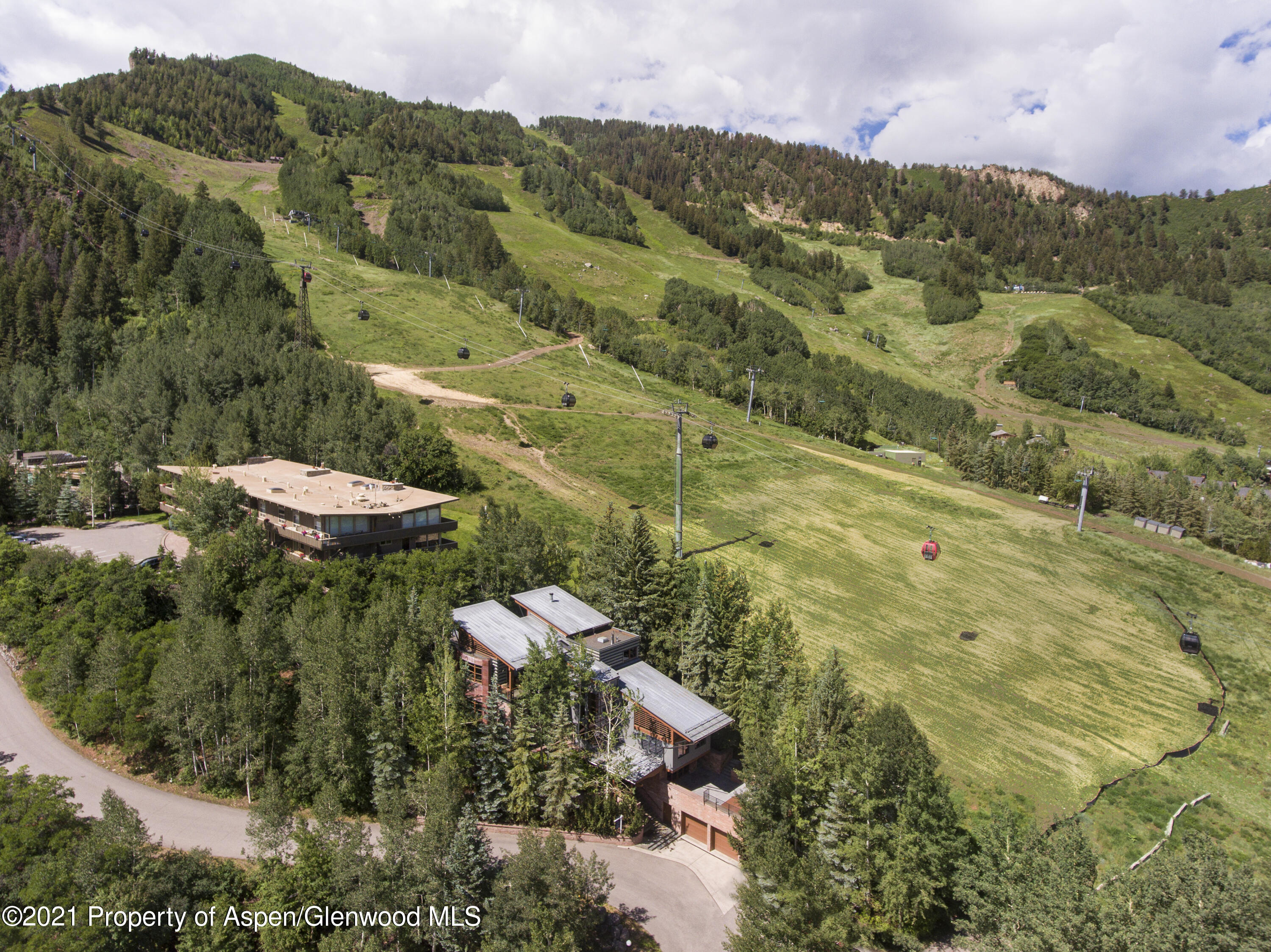 550 Aspen Alps Road South Aspen, CO 81611 - Photo 15 of 58 an aerial view of a house with a yard