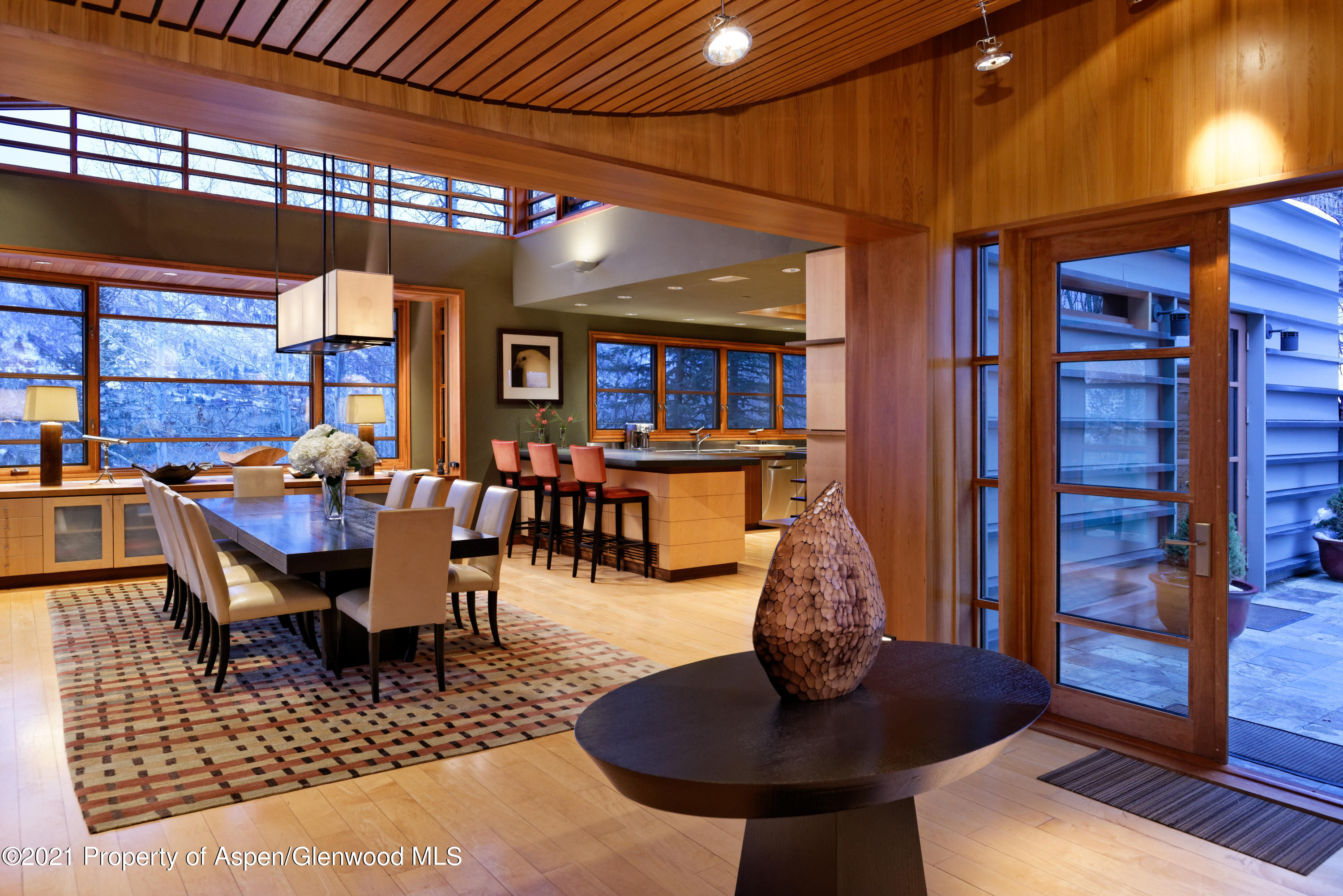 550 Aspen Alps Road South Aspen, CO 81611 - Photo 31 of 58 a dining room with furniture and a chandelier
