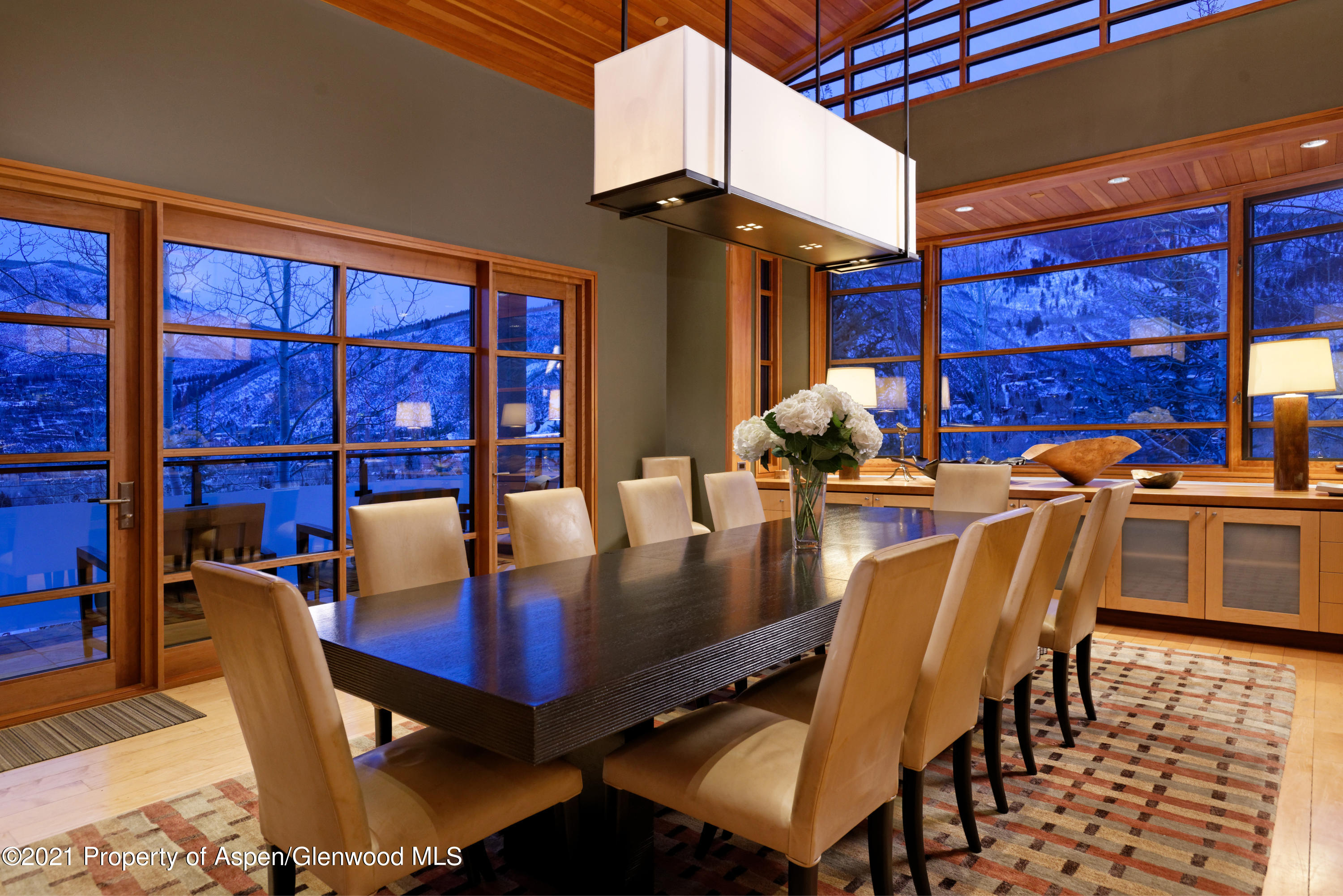 550 Aspen Alps Road South Aspen, CO 81611 - Photo 33 of 58 a dining room with furniture and wooden floor