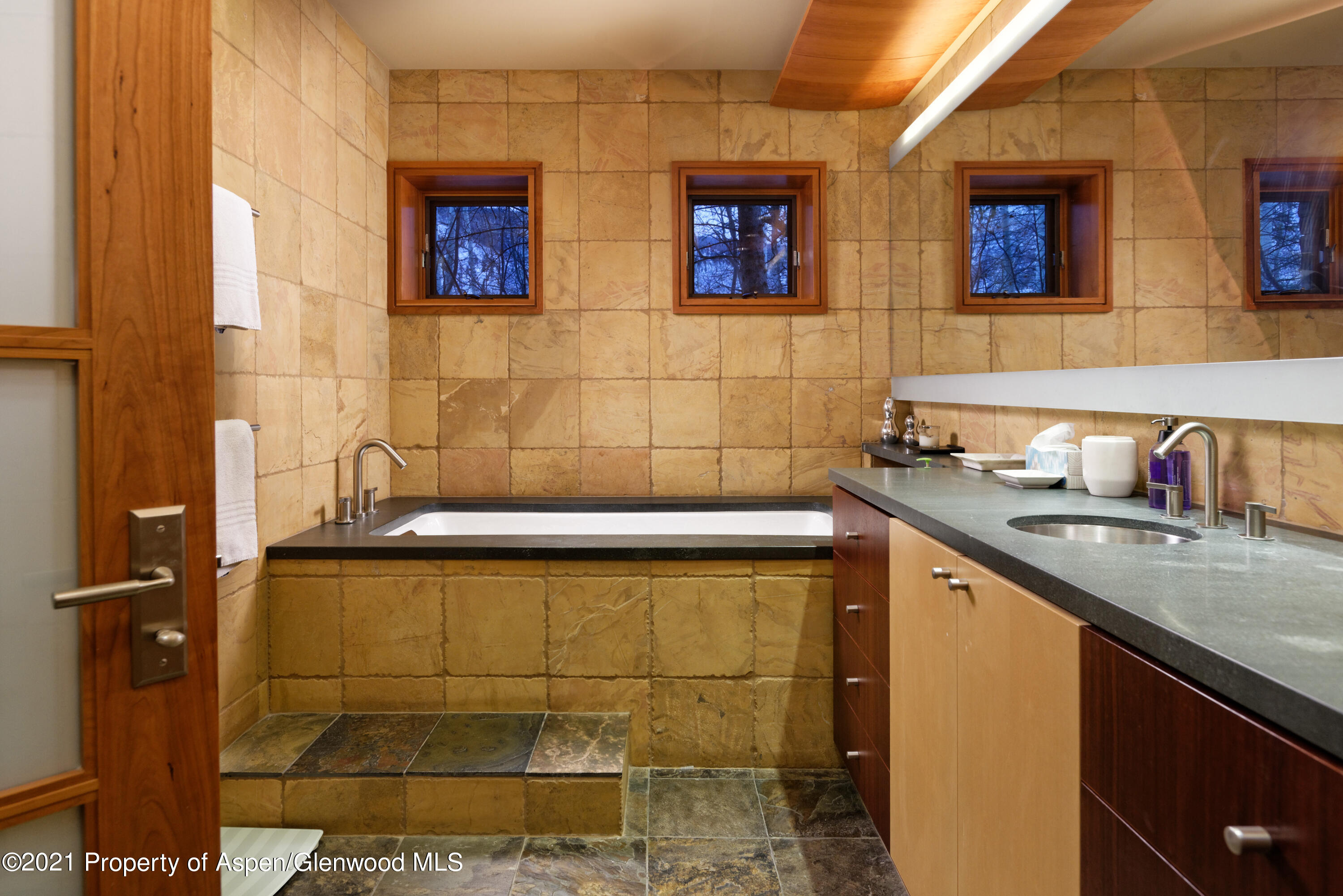 550 Aspen Alps Road South Aspen, CO 81611 - Photo 41 of 58 a bathroom with a sink and a bathtub