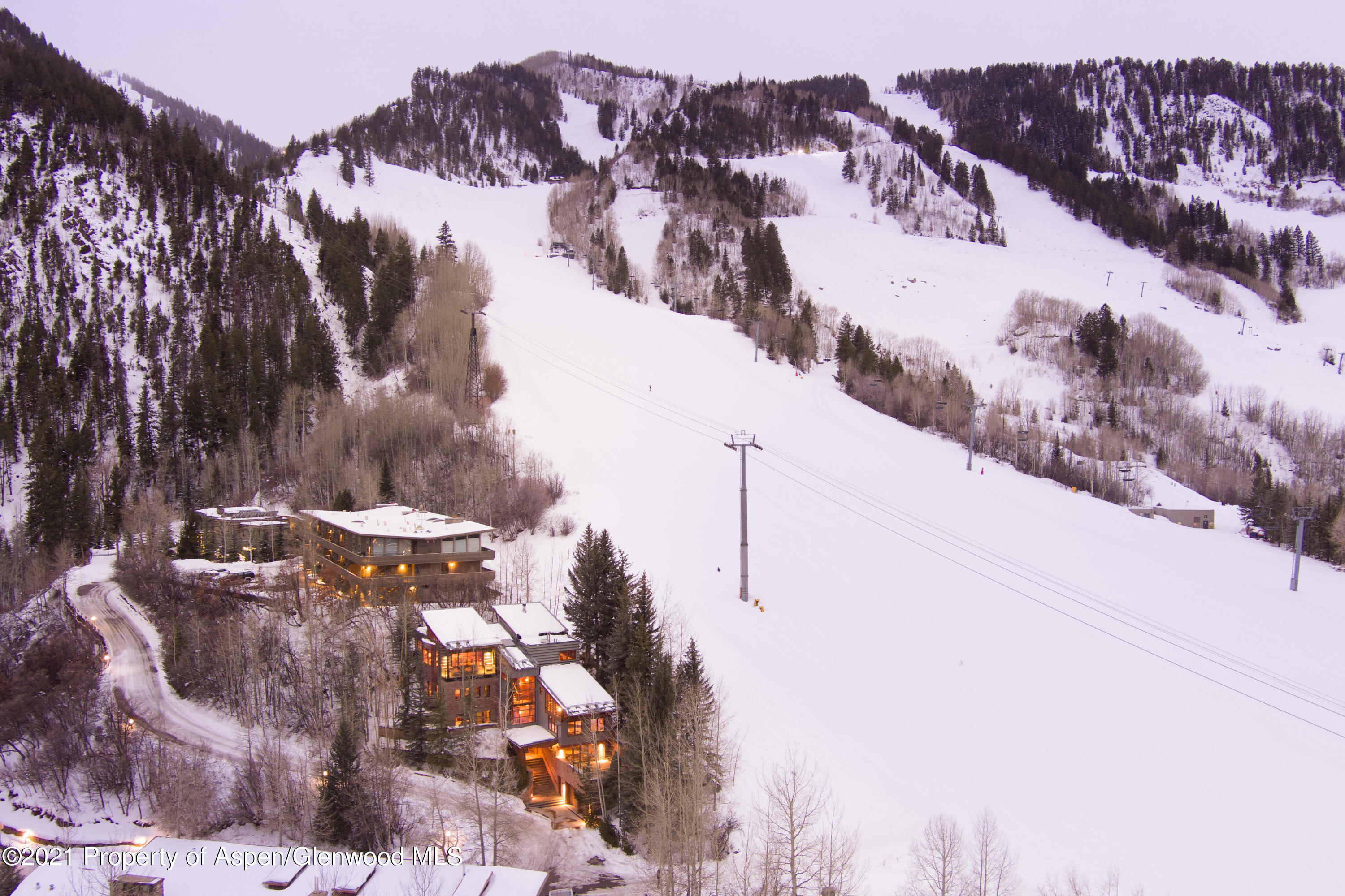 550 Aspen Alps Road South Aspen, CO 81611 - Photo 56 of 58 a view of a city with mountains in the background