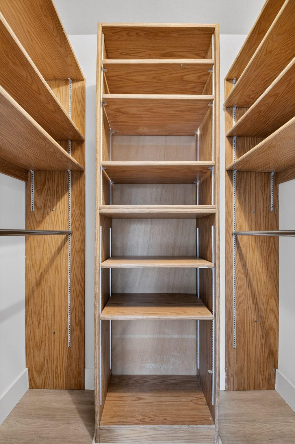 14475 Strathmore Lane, Unit 305 Delray Beach, FL 33446 - Photo 16 of 27 a view of walk in closet with empty racks