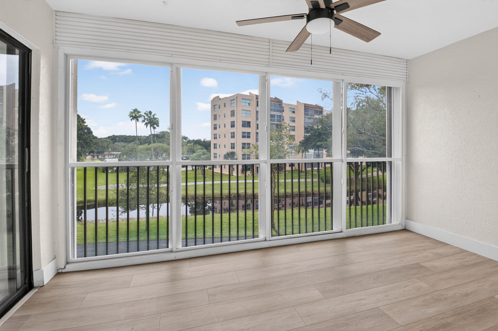 14475 Strathmore Lane, Unit 305 Delray Beach, FL 33446 - Photo 2 of 27 a view of a room with a large window