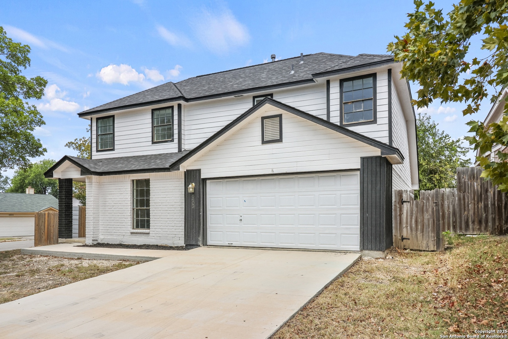 6403 Gray Ridge San Antonio, TX 78233 - Photo 16 of 50 a front view of a house with a garage