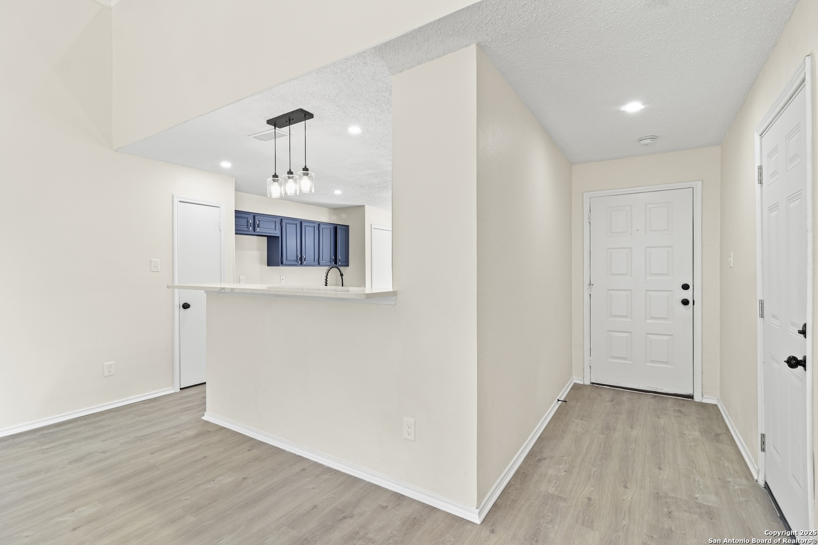 6403 Gray Ridge San Antonio, TX 78233 - Photo 20 of 50 a view of a kitchen from the hallway