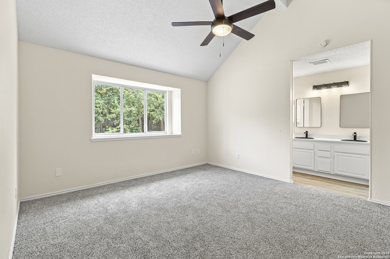 6403 Gray Ridge San Antonio, TX 78233 - Photo 28 of 50 a view of empty room with windows and ceiling fan
