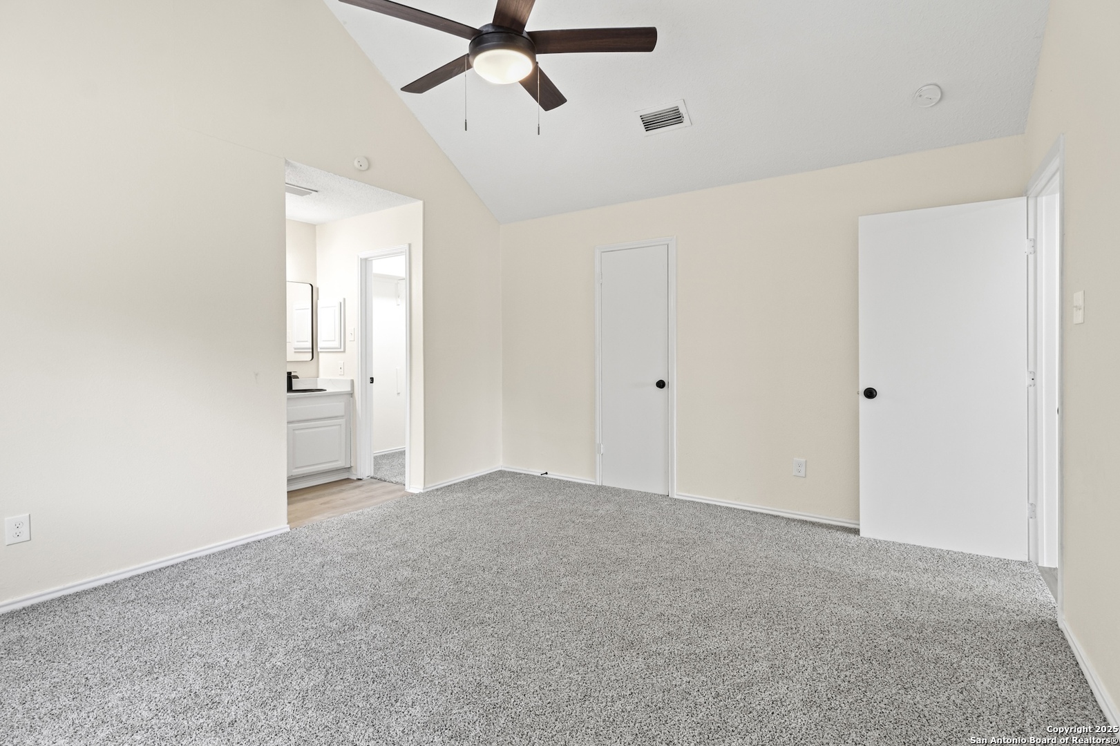 6403 Gray Ridge San Antonio, TX 78233 - Photo 30 of 50 a view of a big room with chandelier fan and closet