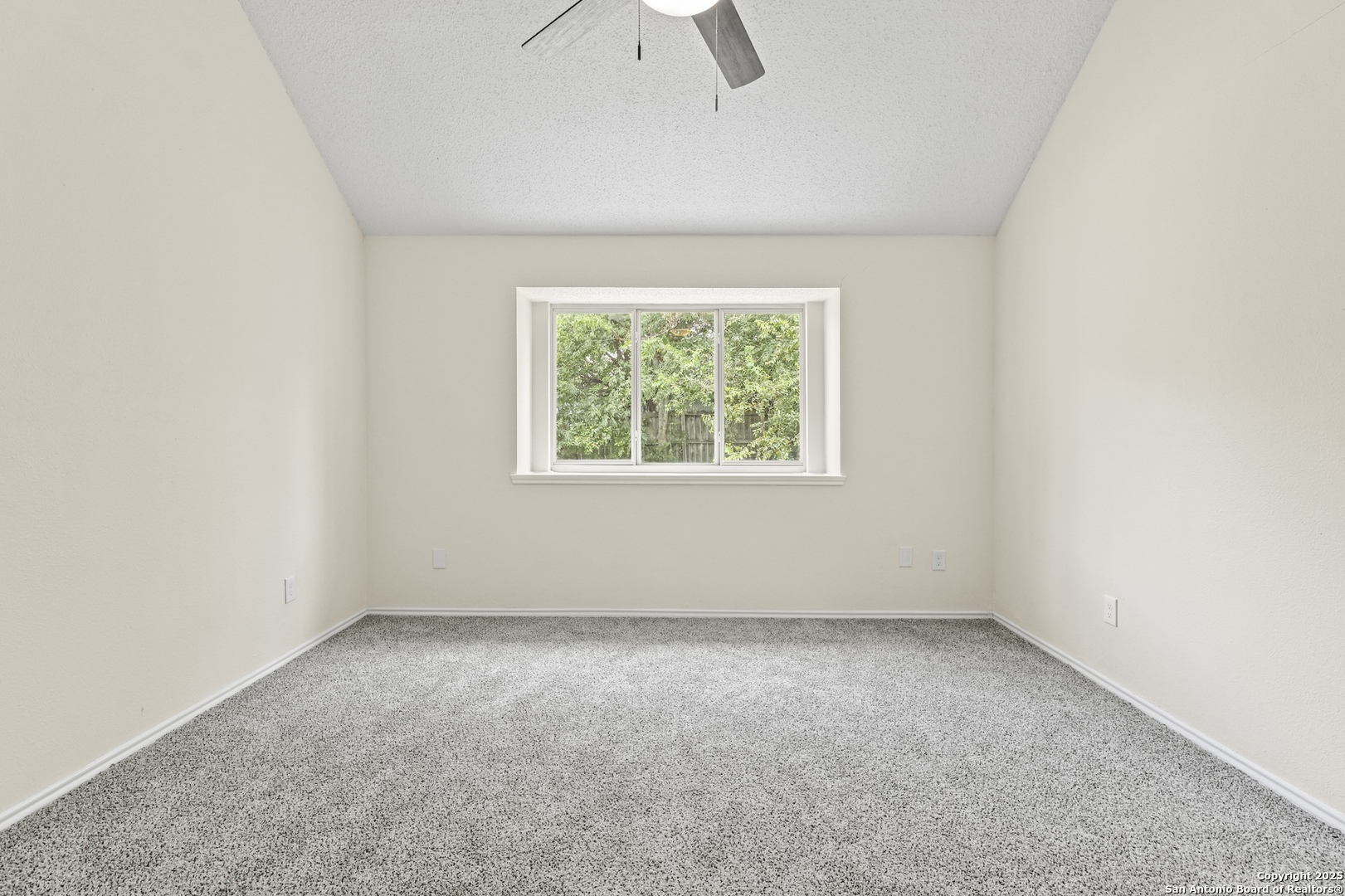 6403 Gray Ridge San Antonio, TX 78233 - Photo 31 of 50 an empty room with a window