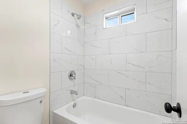 a bathroom with a bathtub