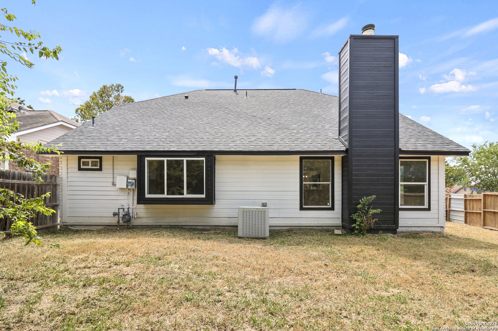 6403 Gray Ridge San Antonio, TX 78233 - Photo 48 of 50 a front view of a house with a yard