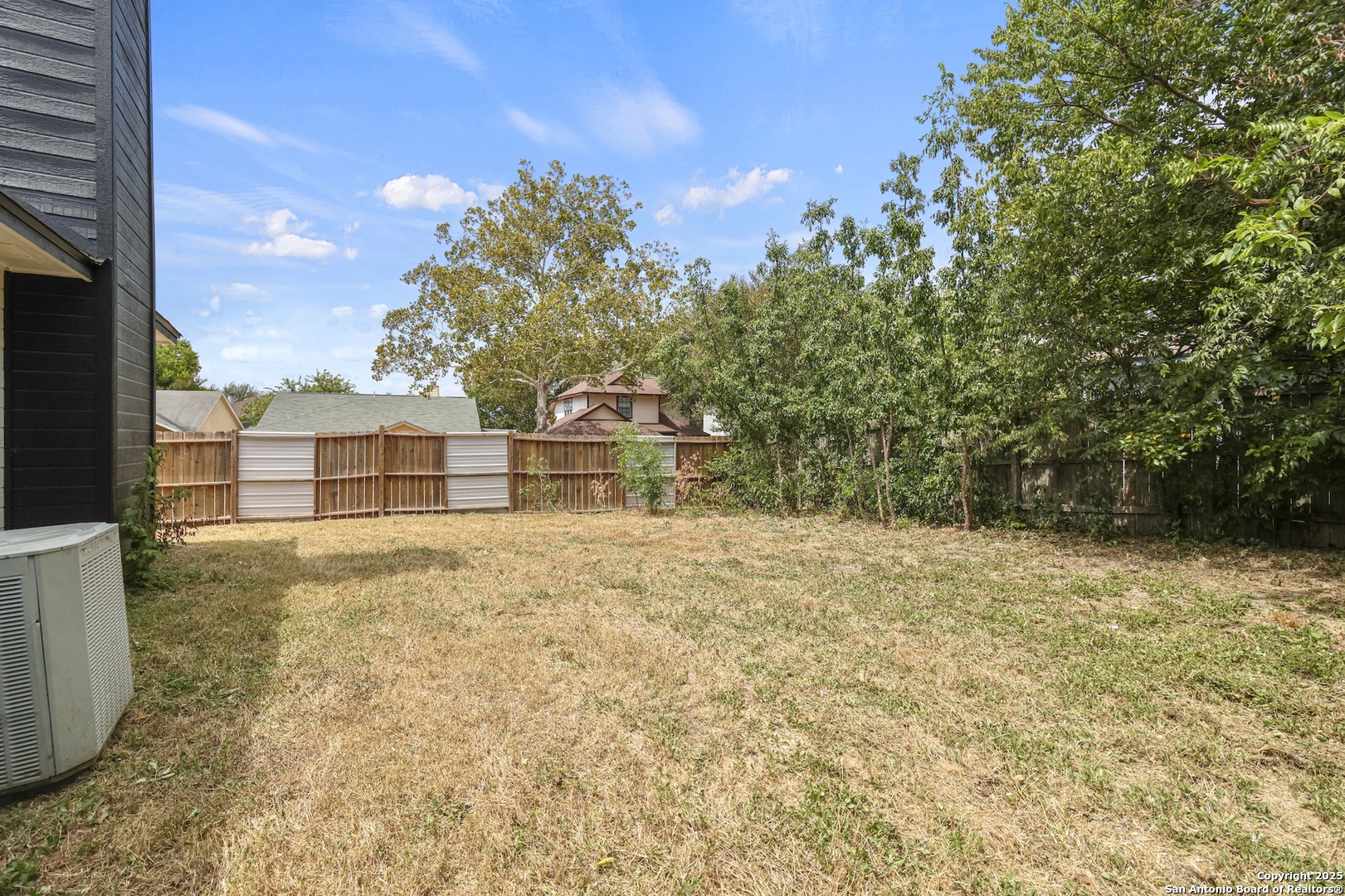 6403 Gray Ridge San Antonio, TX 78233 - Photo 49 of 50 a front view of a house with a yard