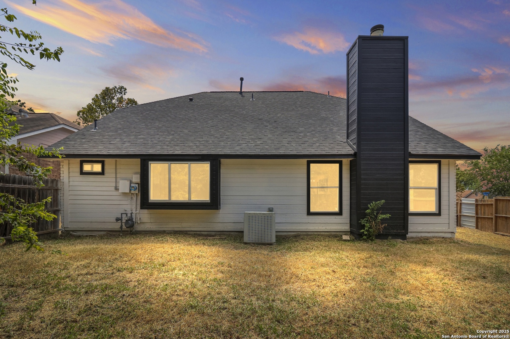 6403 Gray Ridge San Antonio, TX 78233 - Photo 50 of 50 a front view of a house with a yard