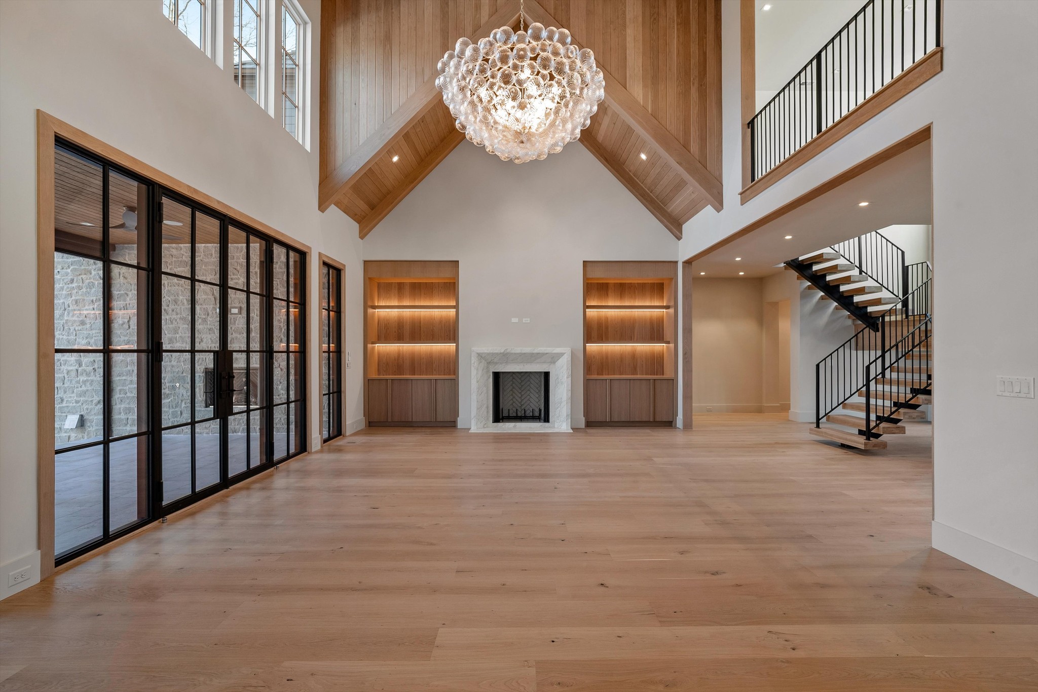 4328 Sneed Road Nashville, TN 37215 - Photo 11 of 35 a view of a livingroom with a staircase