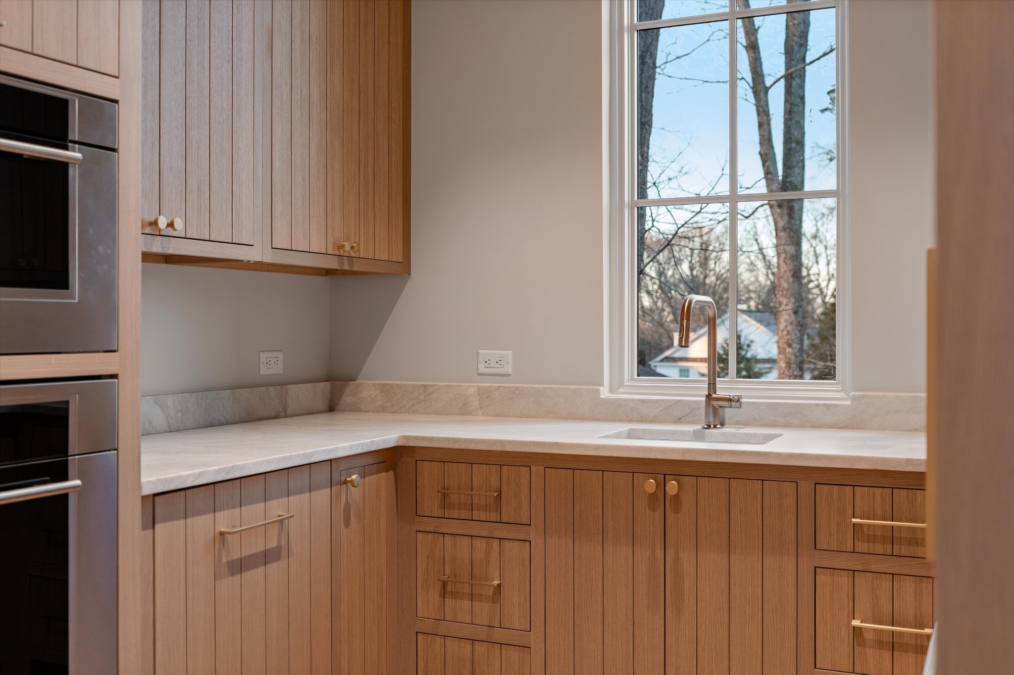 4328 Sneed Road Nashville, TN 37215 - Photo 15 of 35 a kitchen with a sink and cabinets