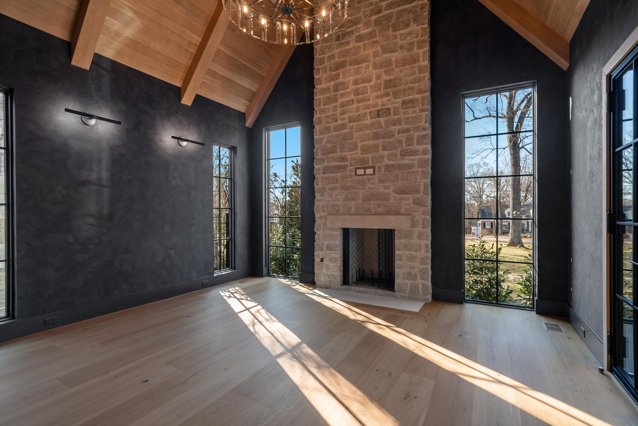 4328 Sneed Road Nashville, TN 37215 - Photo 17 of 35 a view of an empty room with wooden floor and a window