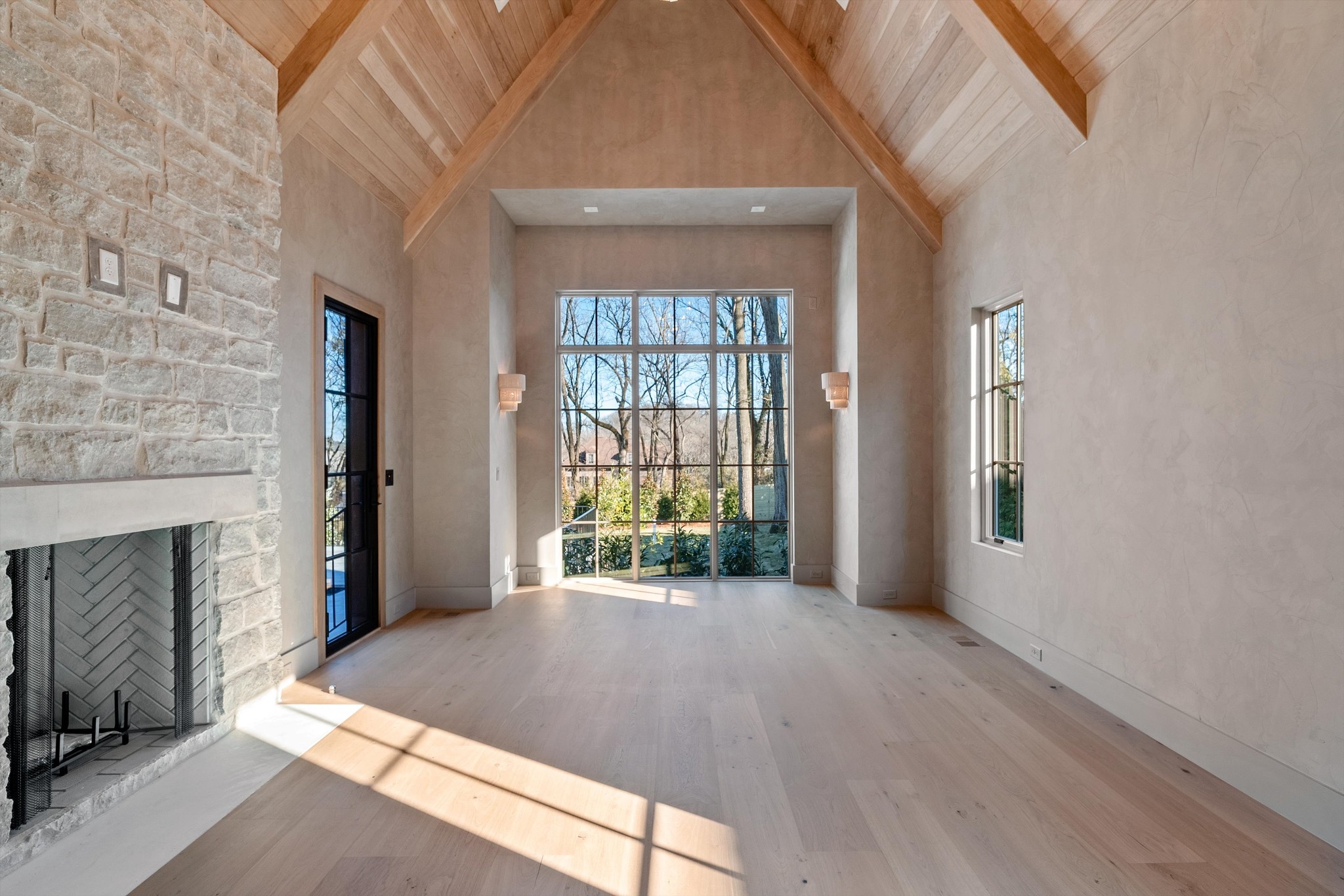 4328 Sneed Road Nashville, TN 37215 - Photo 19 of 35 a view of an empty room with wooden floor and a window