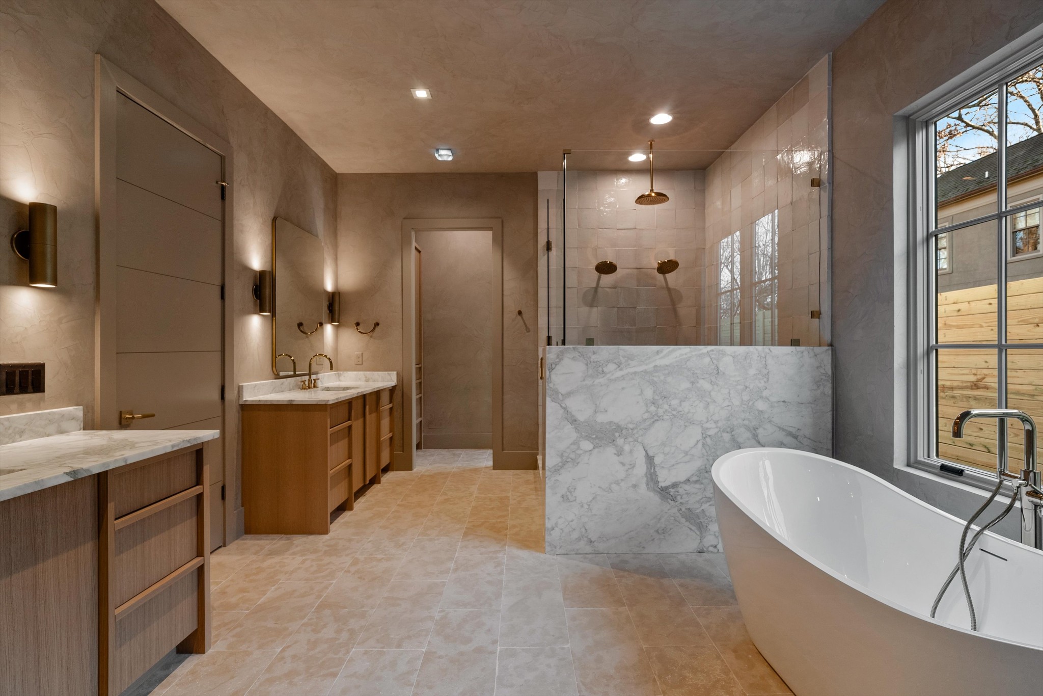 4328 Sneed Road Nashville, TN 37215 - Photo 23 of 35 a large bathroom with a tub a sink a mirror and a shower