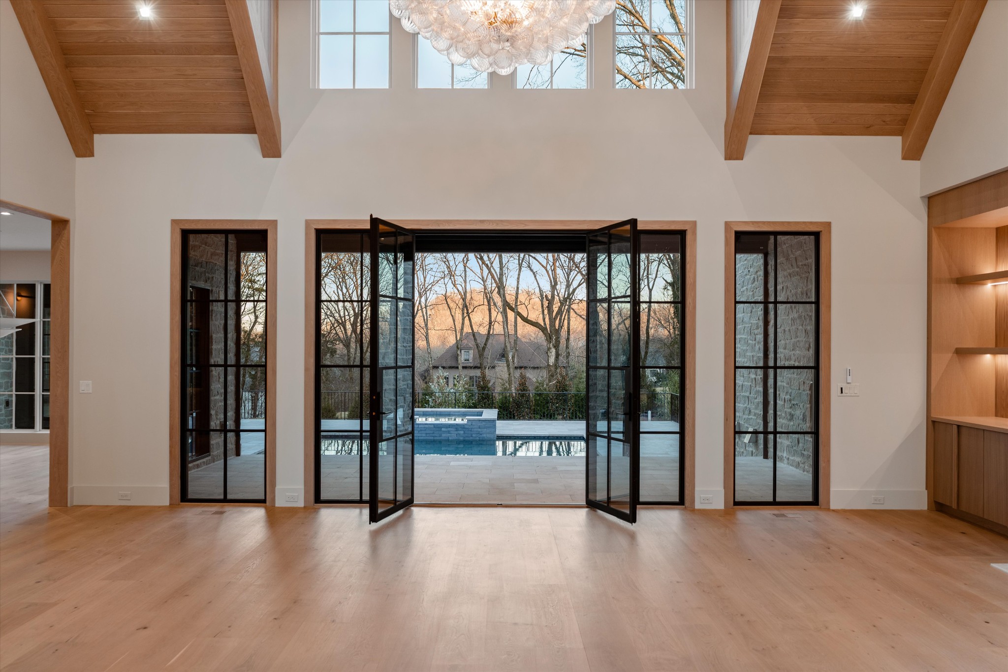 4328 Sneed Road Nashville, TN 37215 - Photo 6 of 35 a view of an empty room with glass door and balcony
