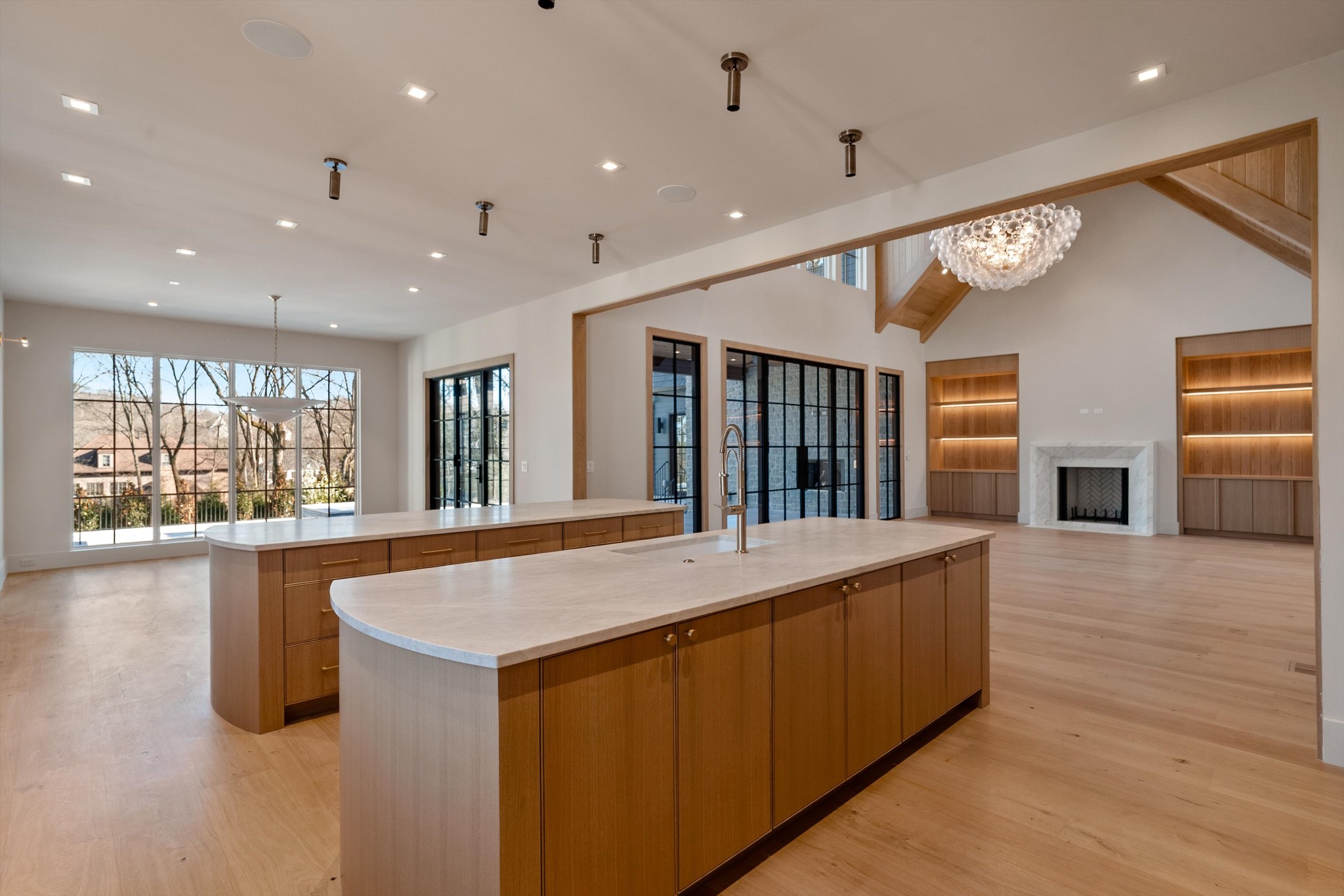 4328 Sneed Road Nashville, TN 37215 - Photo 9 of 35 a large kitchen with kitchen island a large island in it