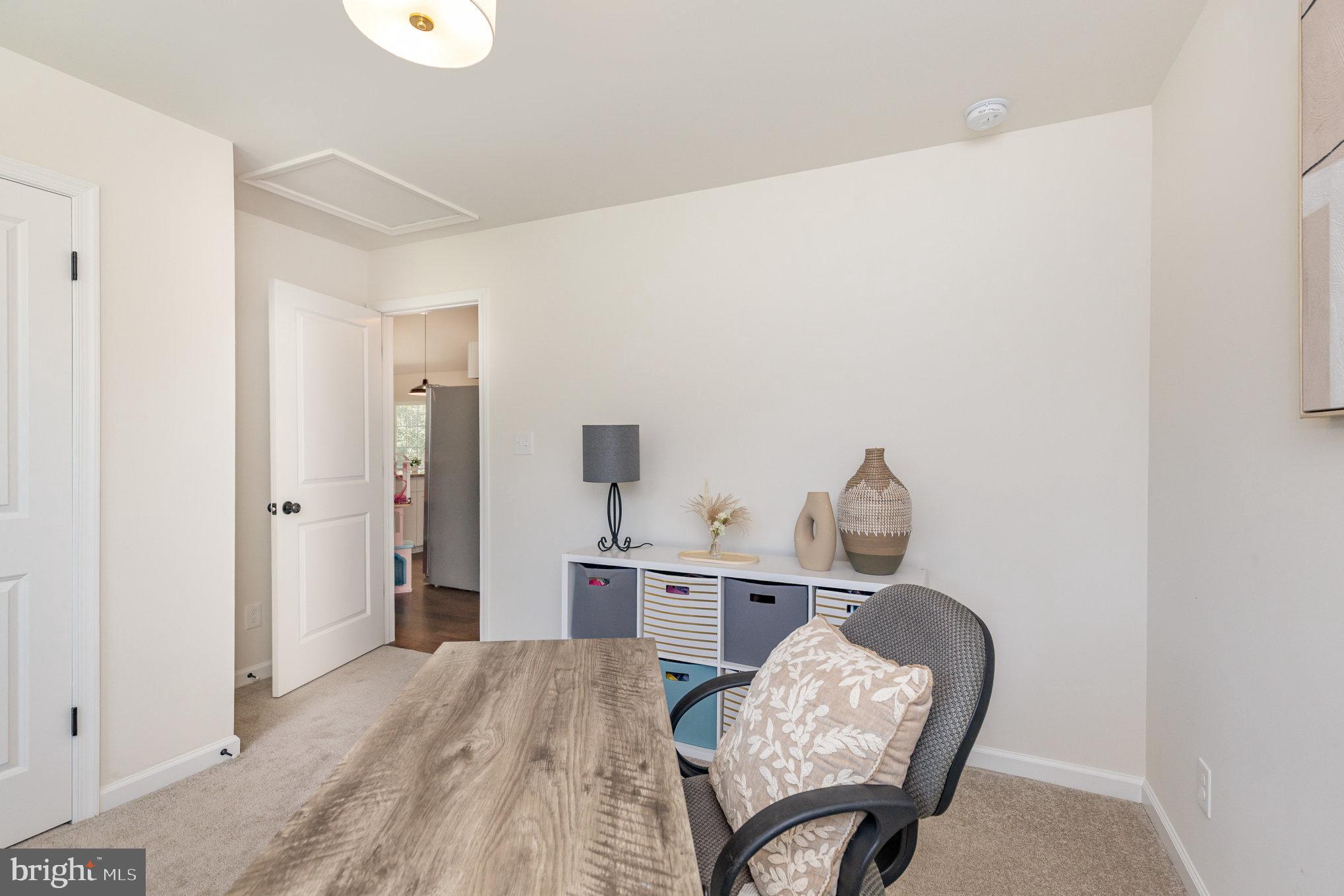 5224 Pendleton Farm Road Bumpass, VA 23024 - Photo 23 of 31 a living room with furniture and a dresser