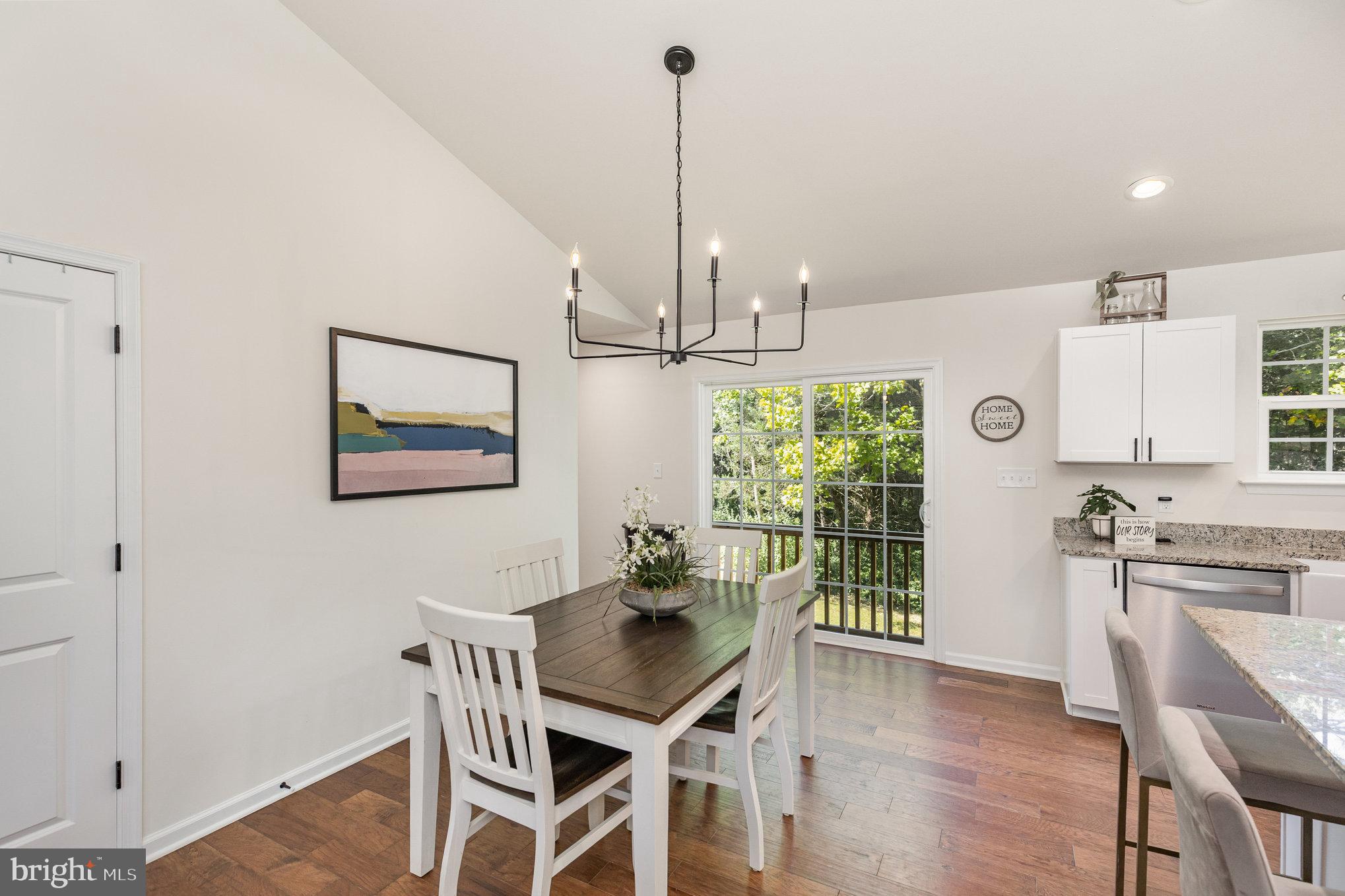 5224 Pendleton Farm Road Bumpass, VA 23024 - Photo 7 of 31 a view of a dining room with furniture window and wooden floor