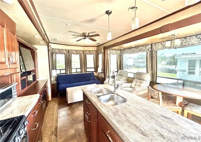 a view of a kitchen with granite countertop lots of counter top space