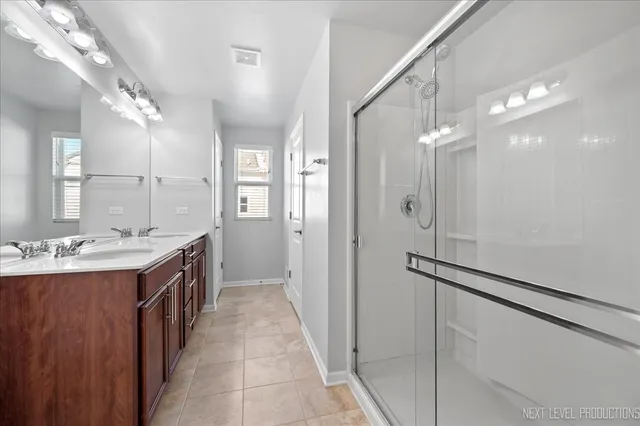 a view of a storage & utility room with closet dryer