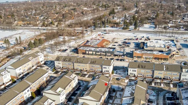 an aerial view of a city with lots of residential buildings