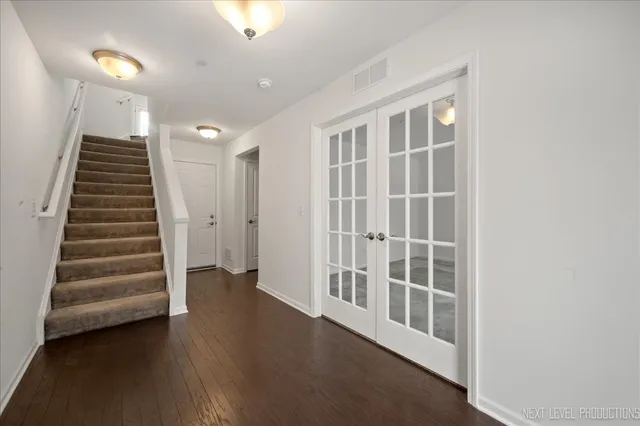 a view of an entryway with stairs