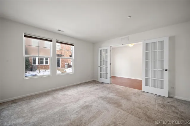 an empty room with windows