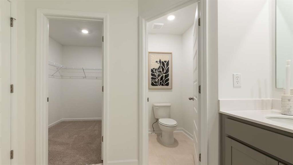 687 Alburgh Alley Mableton, GA 30126 - Photo 37 of 37 a bathroom with a toilet sink and shower