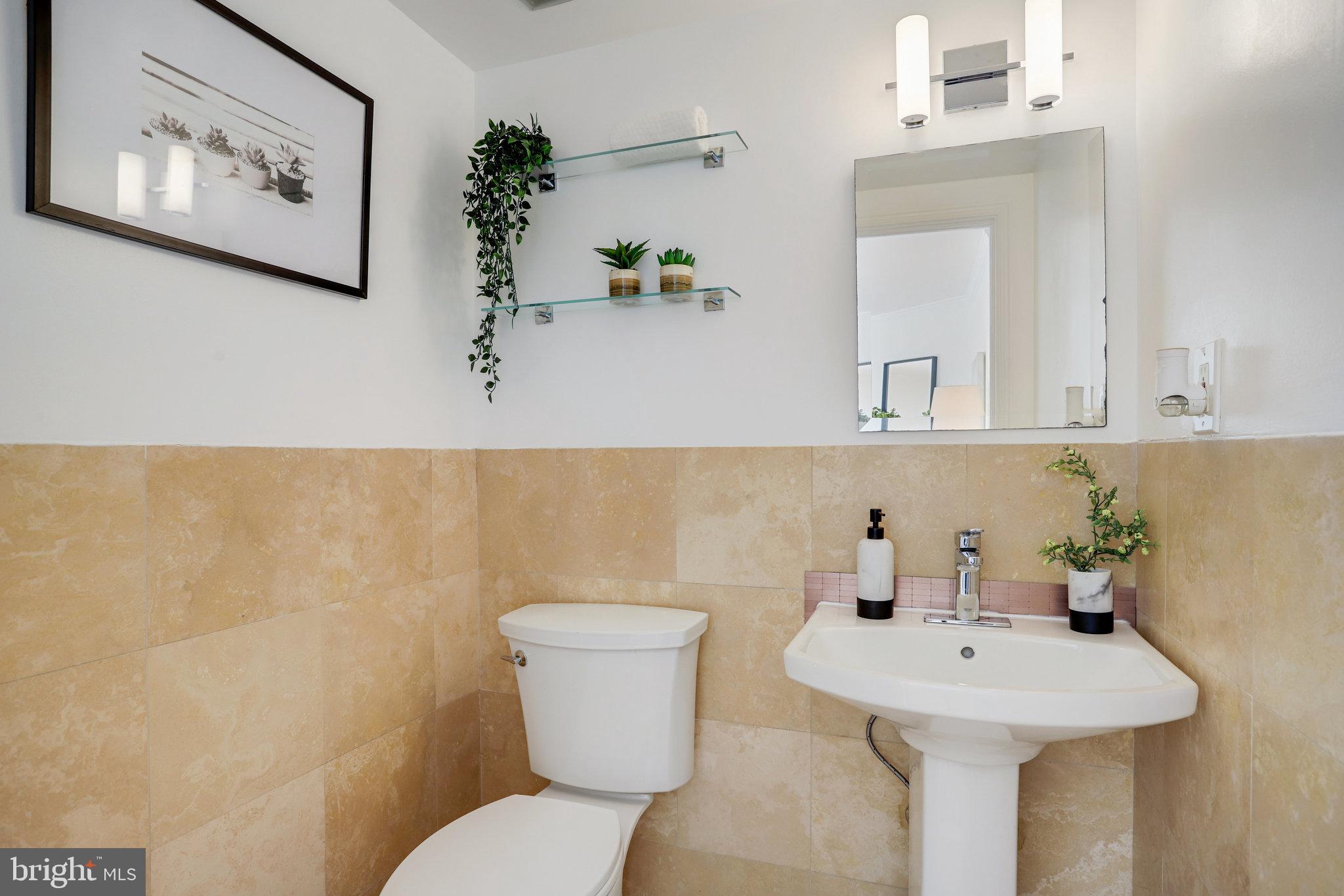 1616 Q Street Northwest, Unit 14 Washington, DC 20009 - Photo 12 of 28 HALF BATH ON MAIN LEVEL