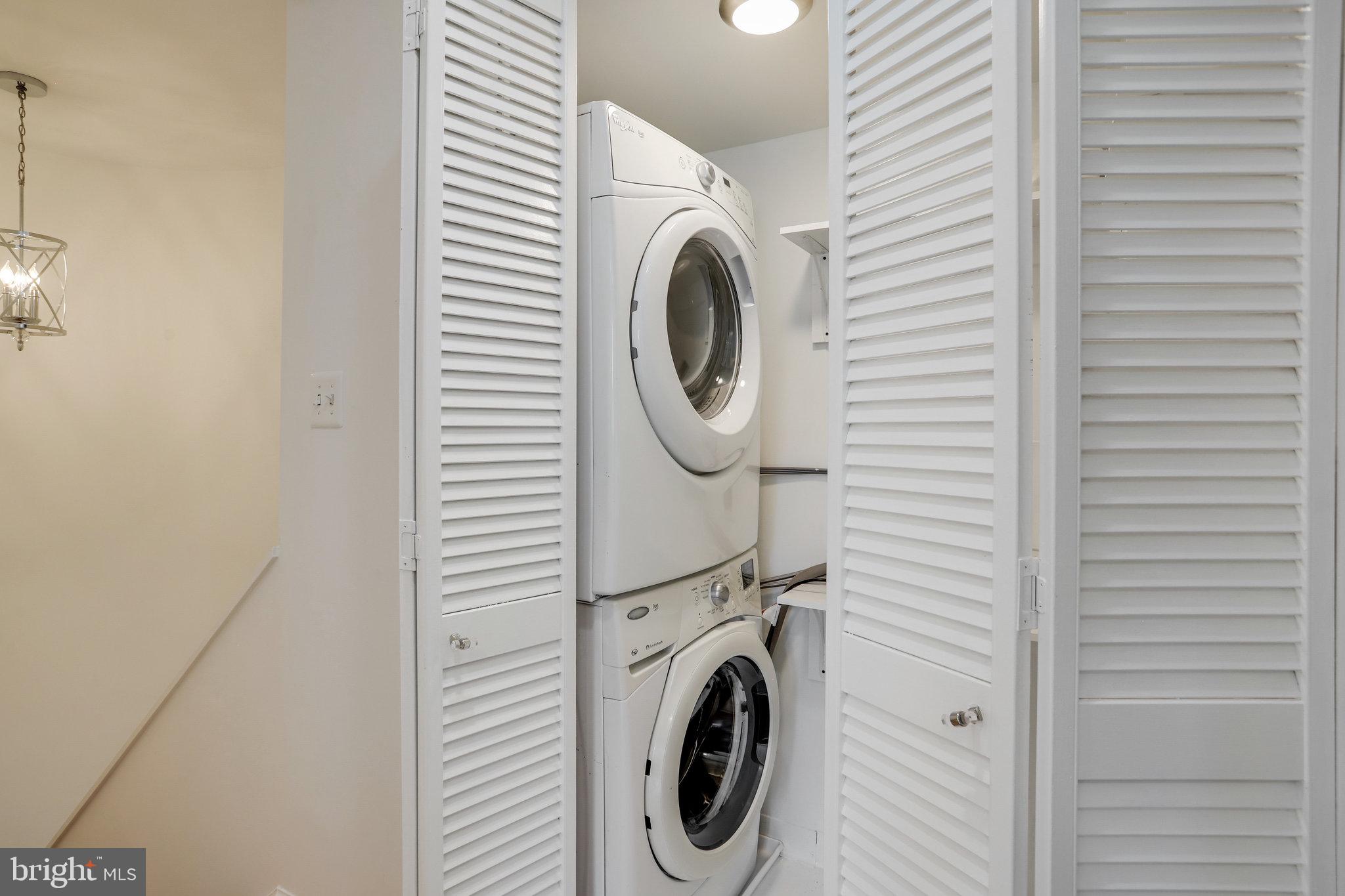 1616 Q Street Northwest, Unit 14 Washington, DC 20009 - Photo 20 of 28 LAUNDRY WITH SHELVING