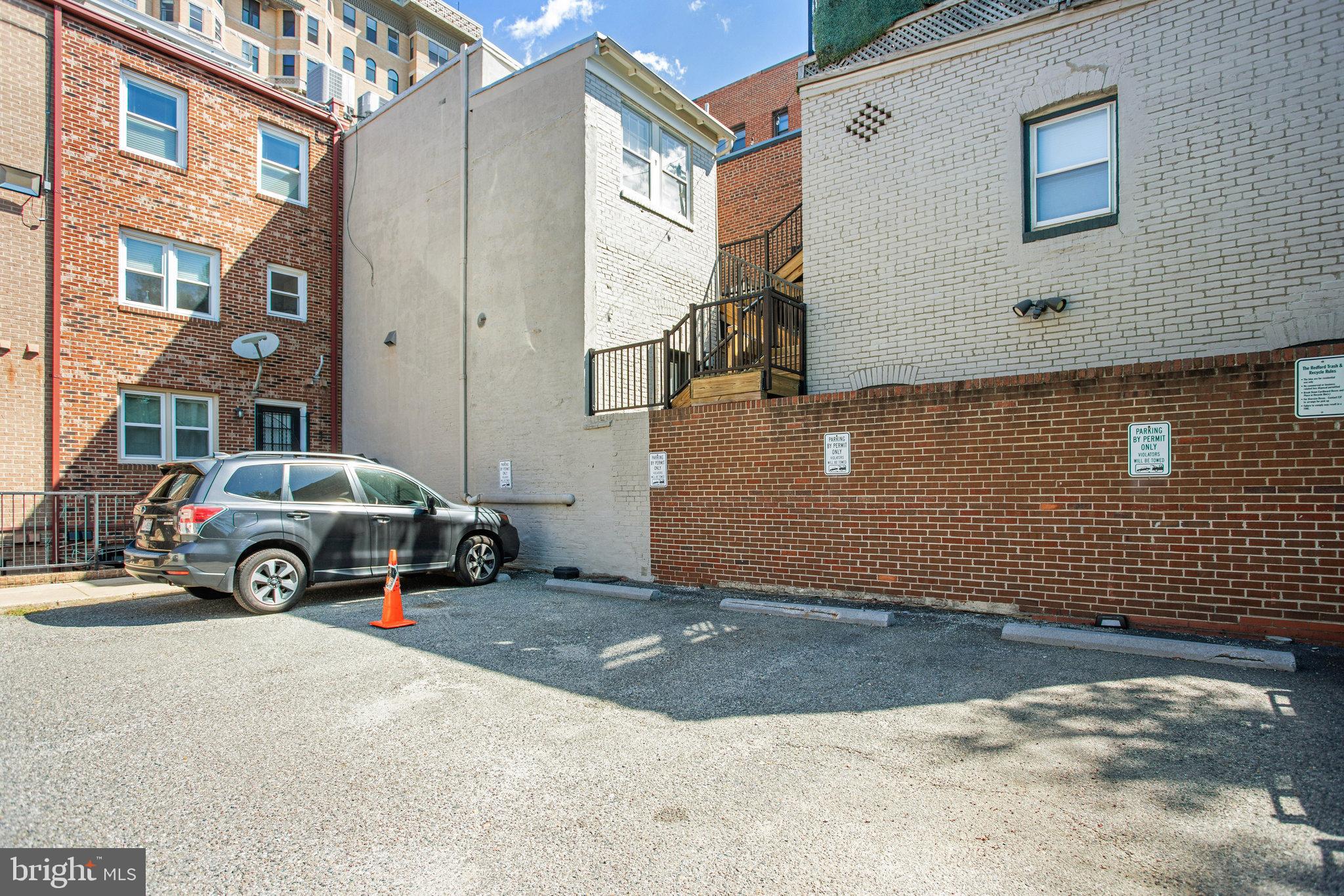 1616 Q Street Northwest, Unit 14 Washington, DC 20009 - Photo 21 of 28 PARKING SPACE IN BACK OF BUILDING