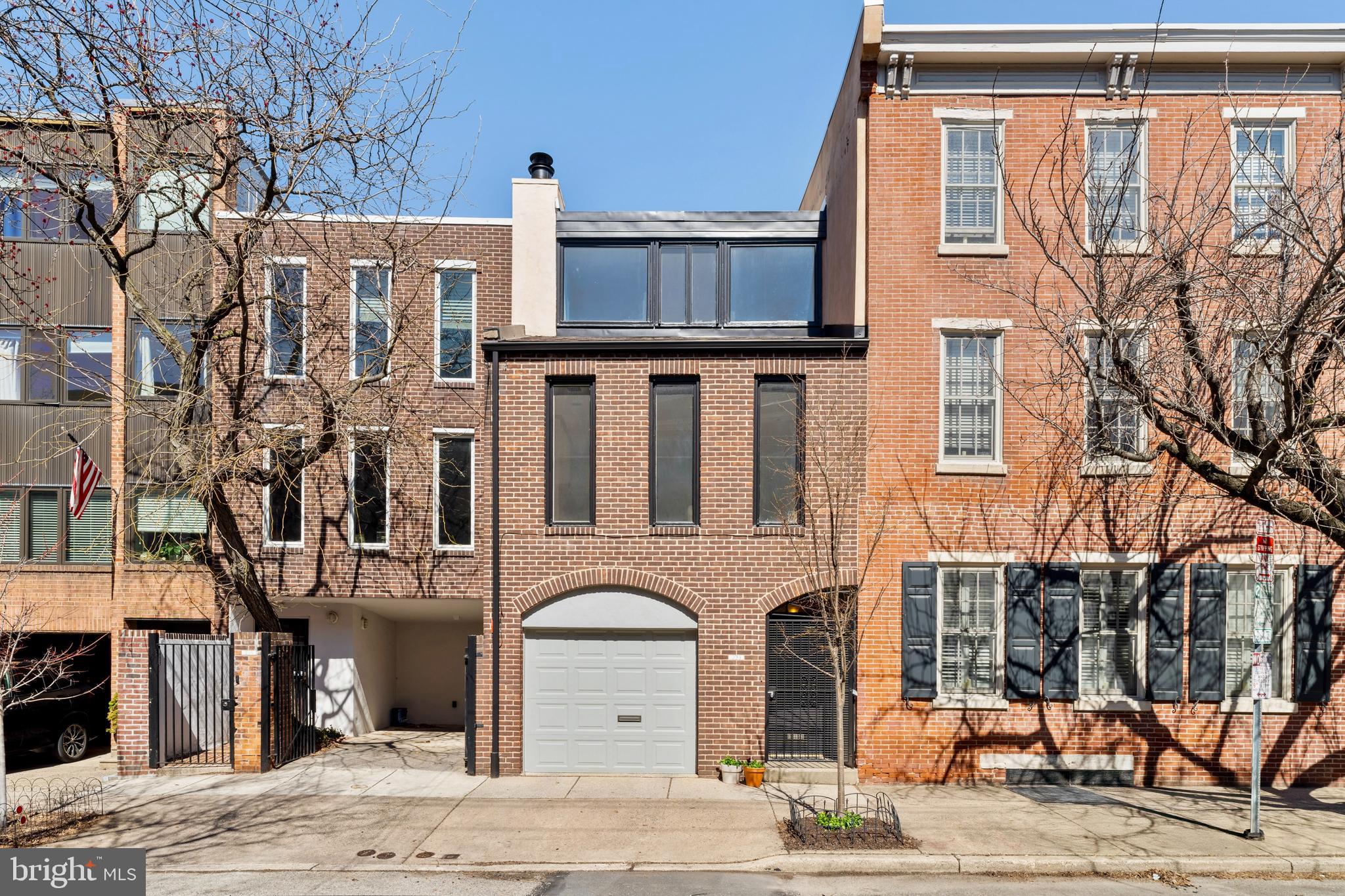 a front view of a building with street view