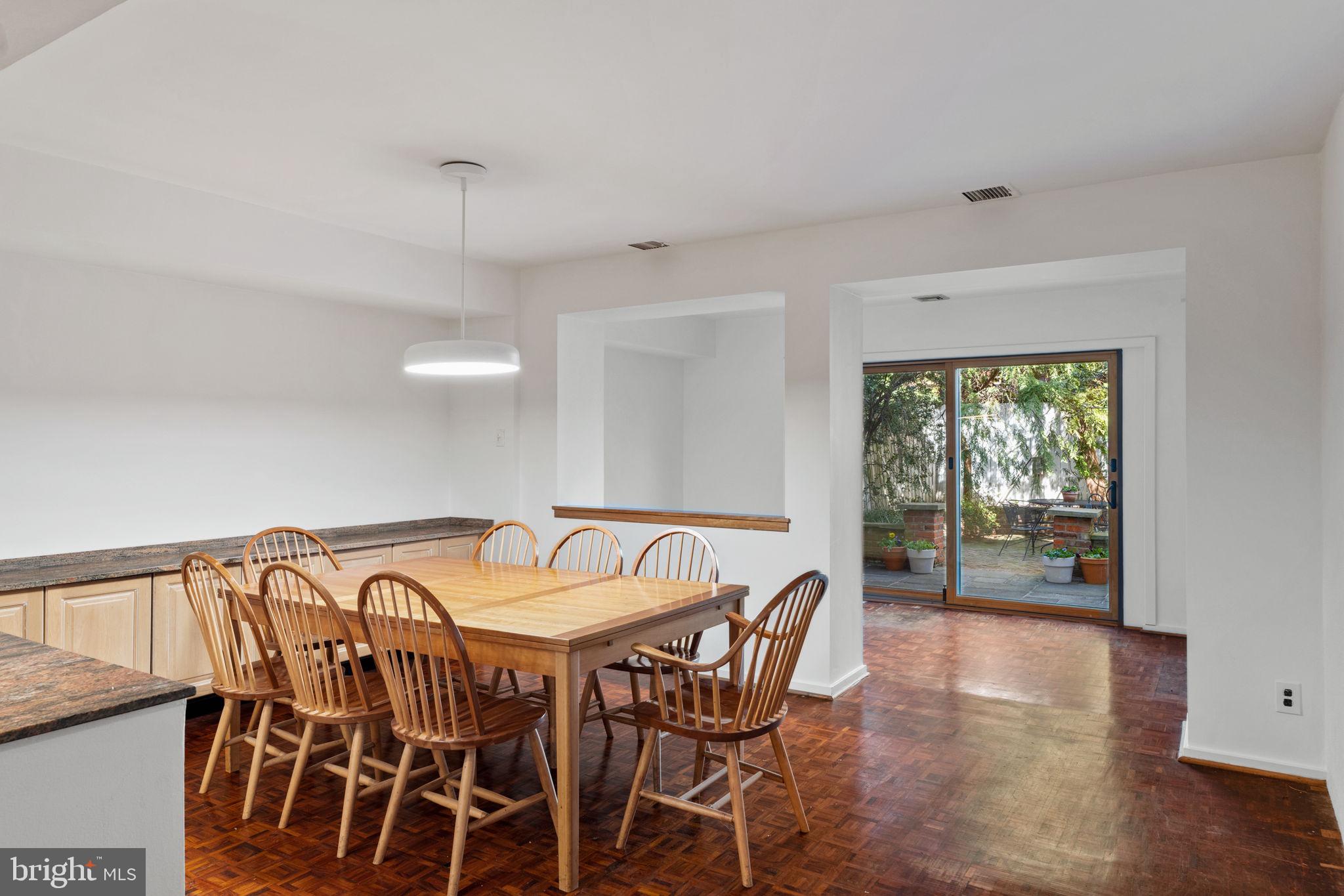 233 Monroe Street Philadelphia, PA 19147 - Photo 13 of 51 a view of a dining room with furniture window and wooden floor