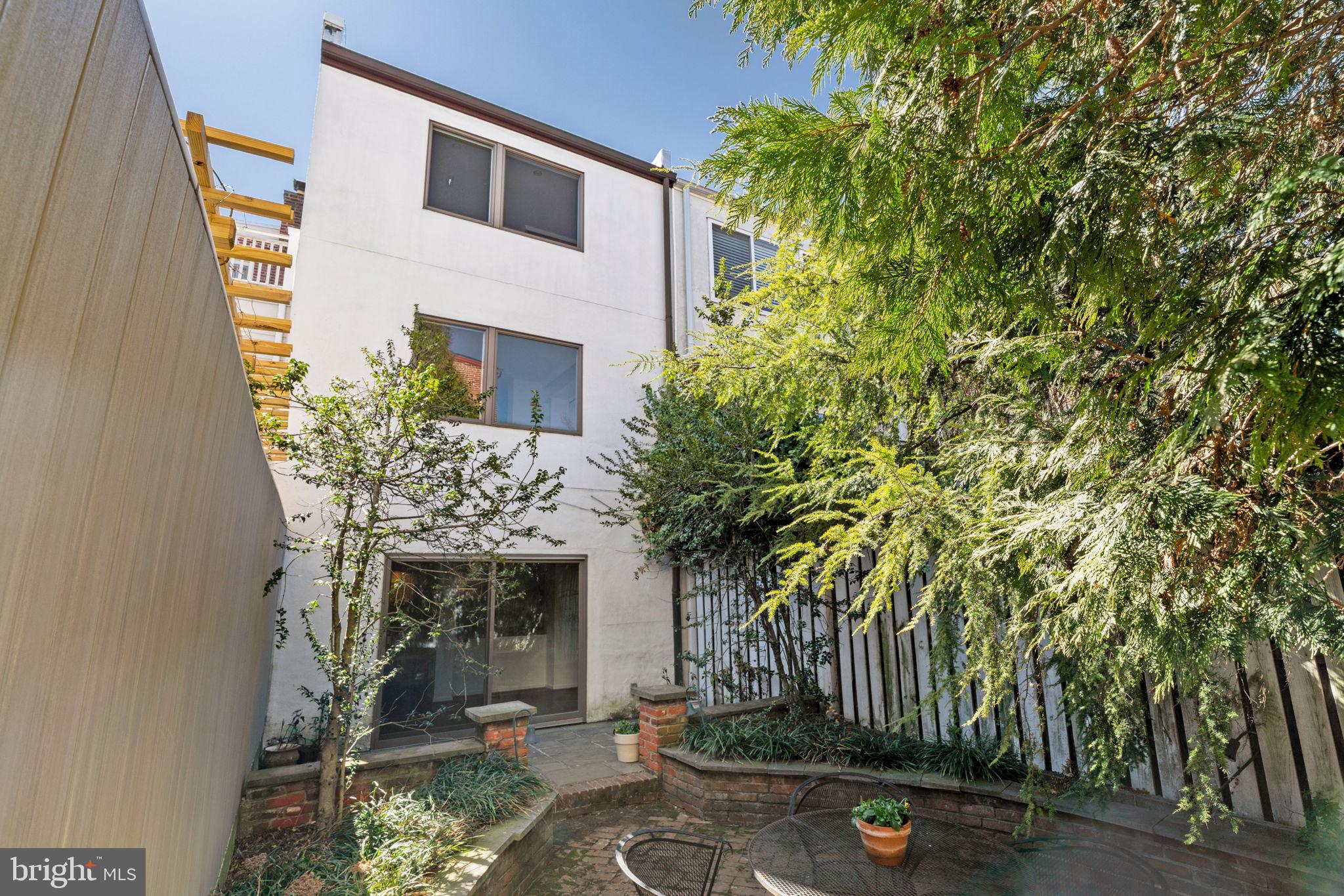233 Monroe Street Philadelphia, PA 19147 - Photo 18 of 51 a front view of a house with garden