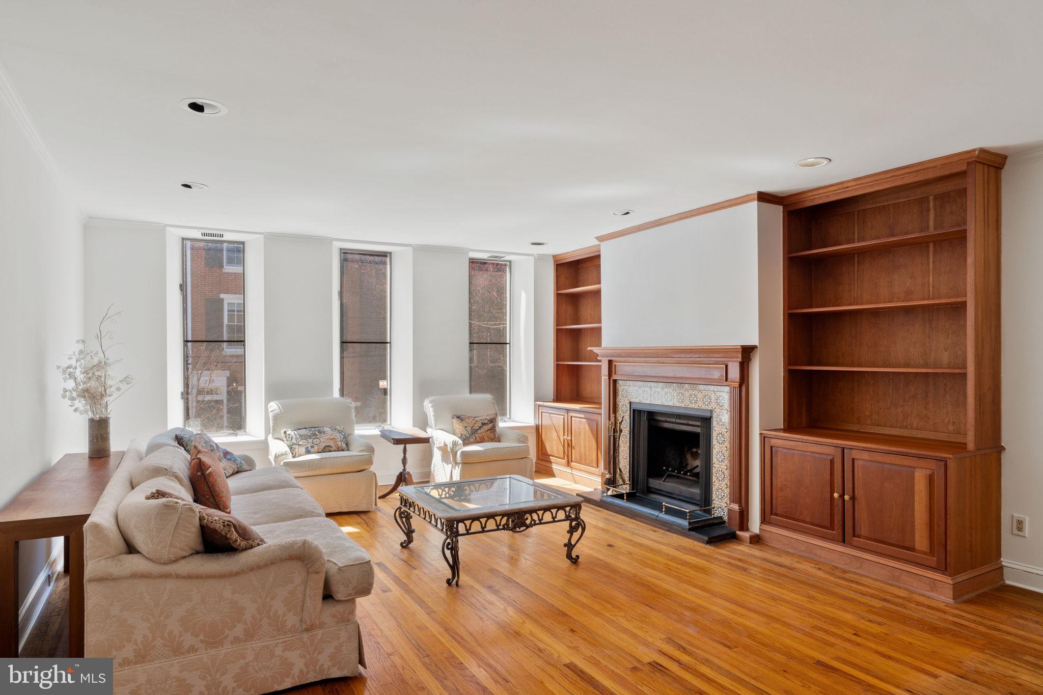 233 Monroe Street Philadelphia, PA 19147 - Photo 19 of 51 a living room with furniture fireplace and window