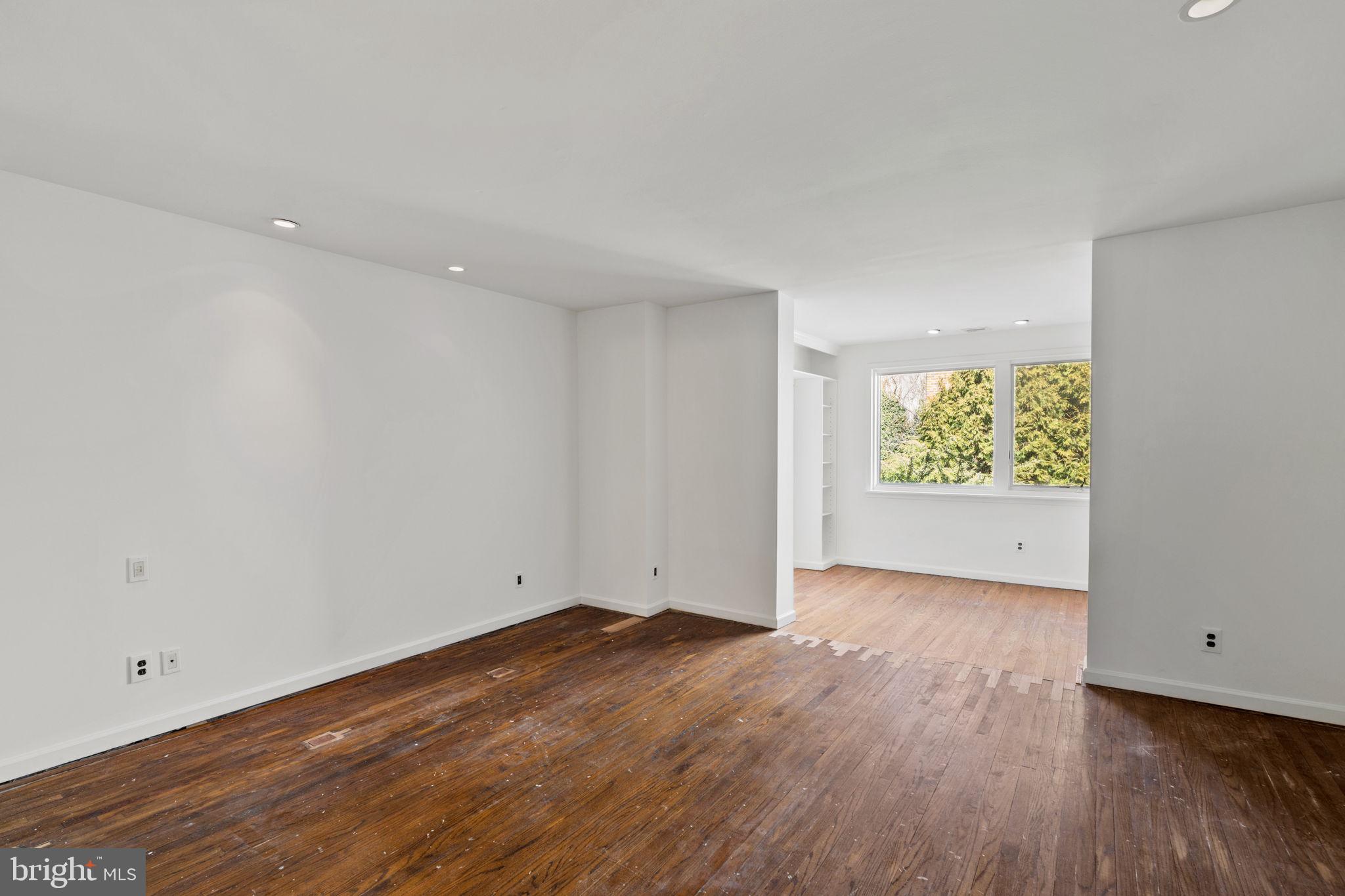 233 Monroe Street Philadelphia, PA 19147 - Photo 26 of 51 a view of an empty room with wooden floor