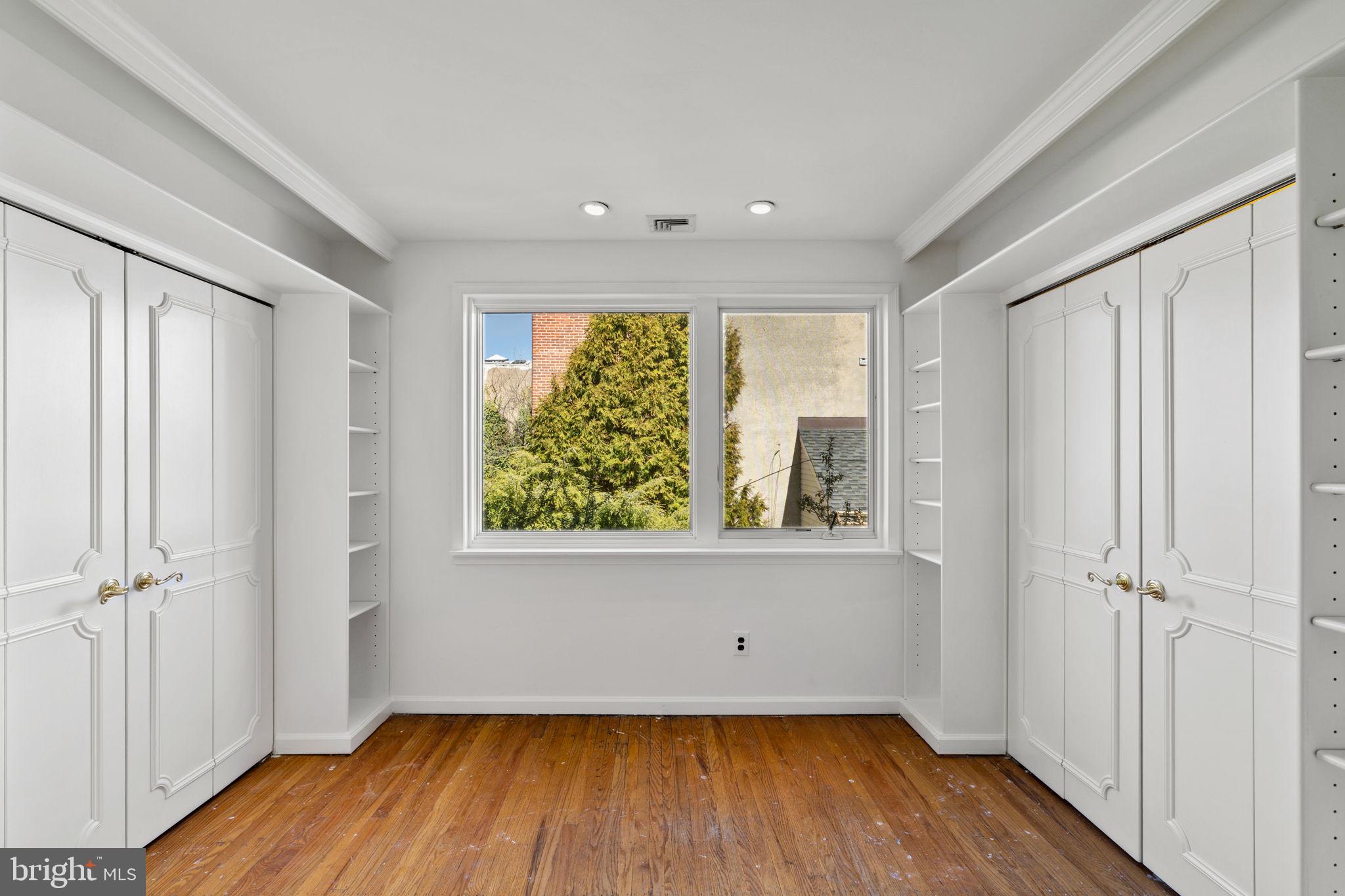 233 Monroe Street Philadelphia, PA 19147 - Photo 29 of 51 wooden floor in an empty room with a window