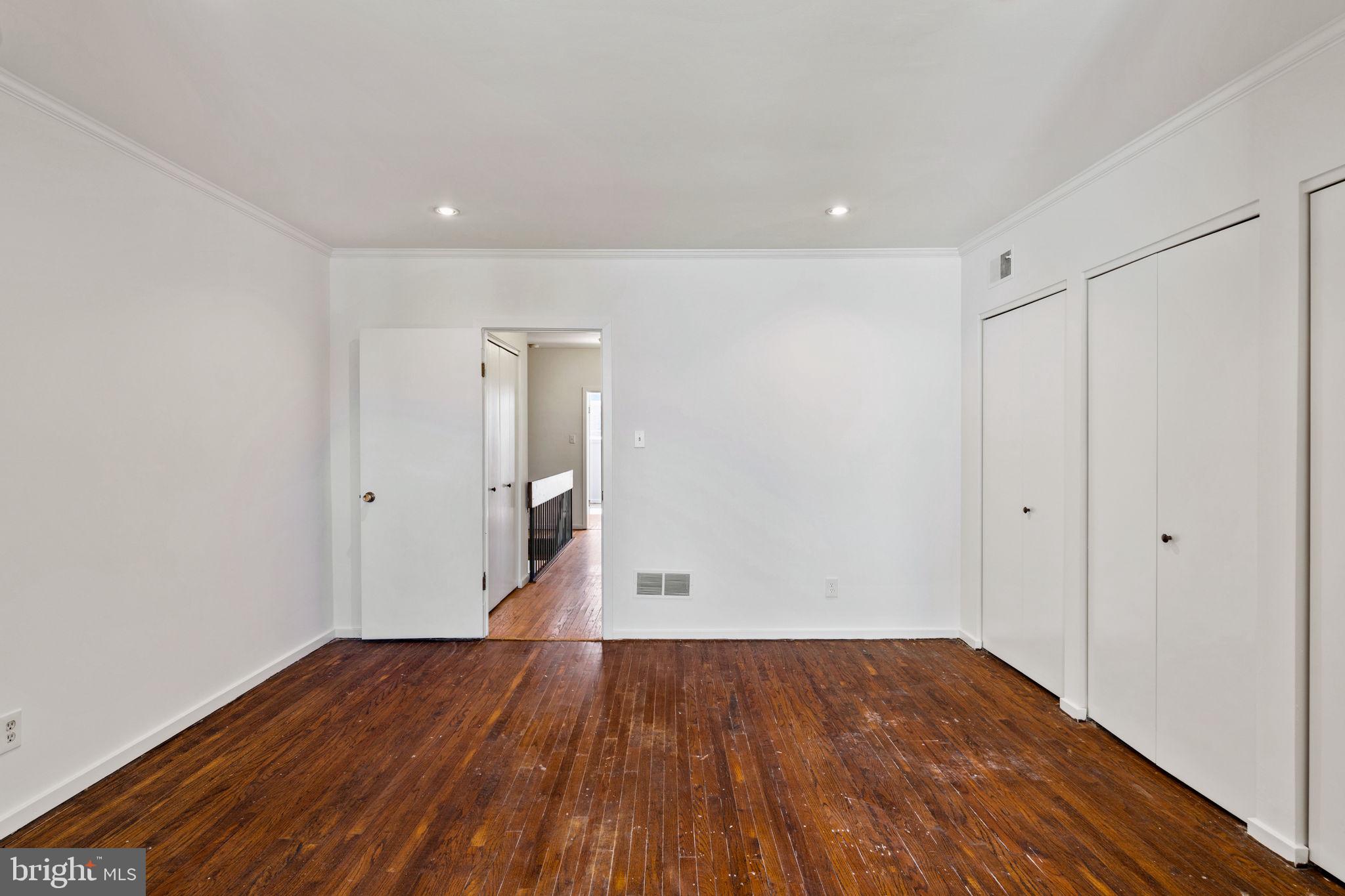 233 Monroe Street Philadelphia, PA 19147 - Photo 43 of 51 a view of an empty room with wooden floor