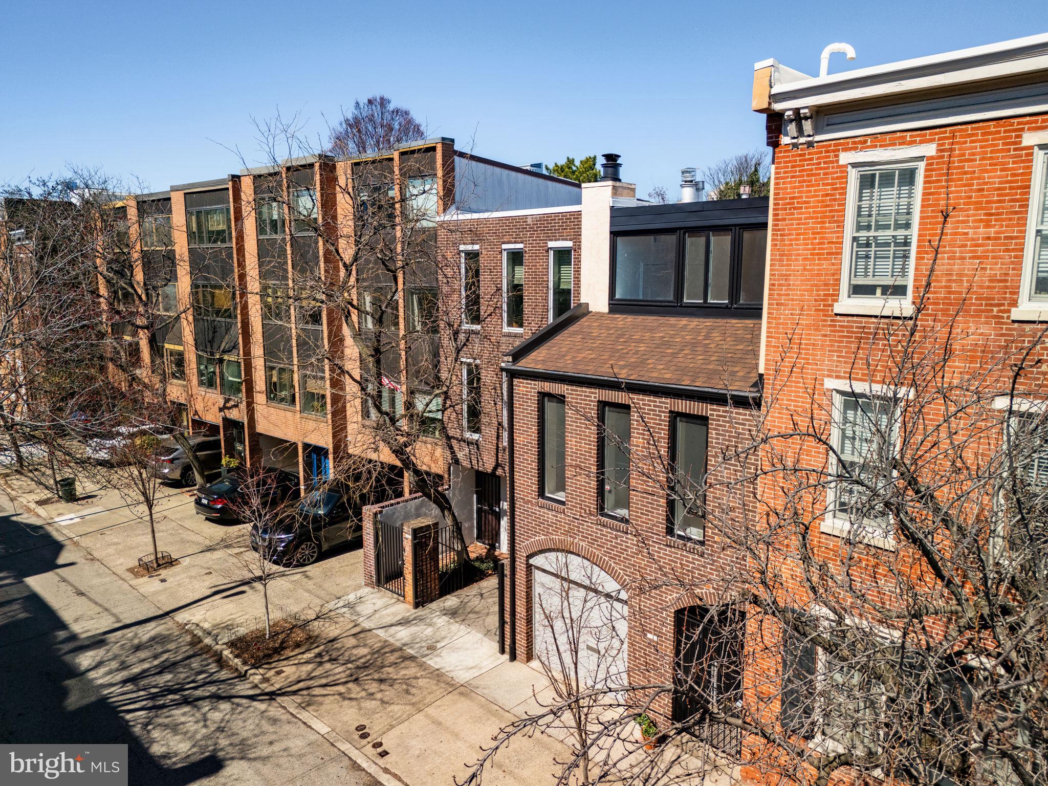 233 Monroe Street Philadelphia, PA 19147 - Photo 45 of 51 front view of a house with a street