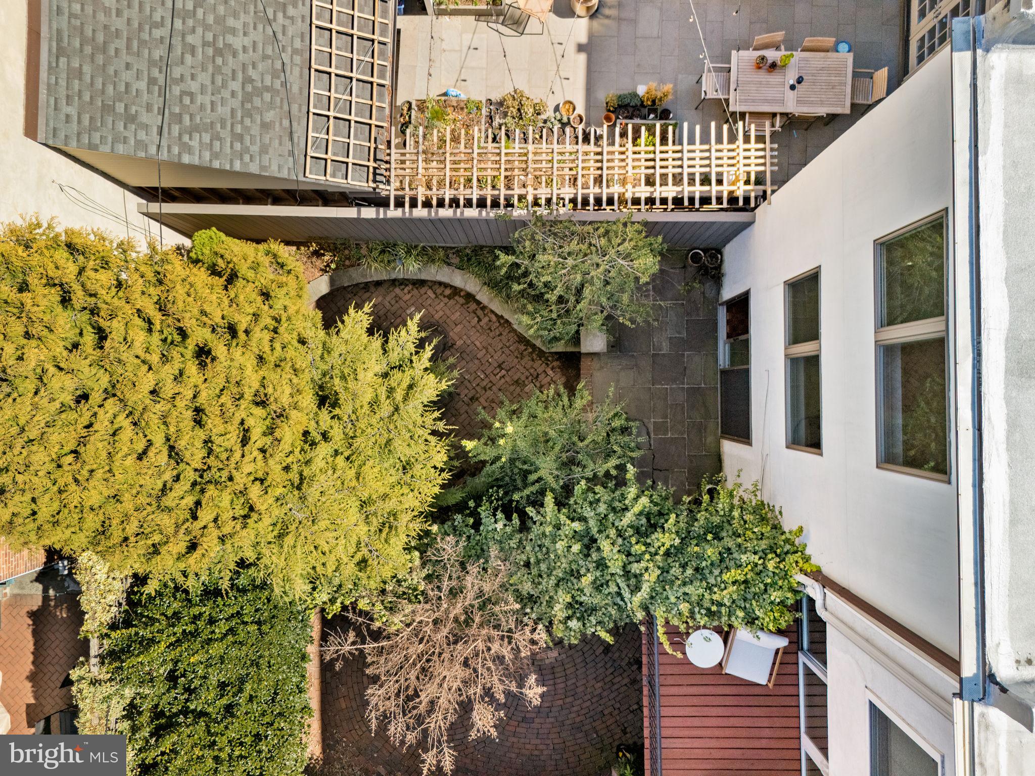 233 Monroe Street Philadelphia, PA 19147 - Photo 50 of 51 front view of a house with a garden