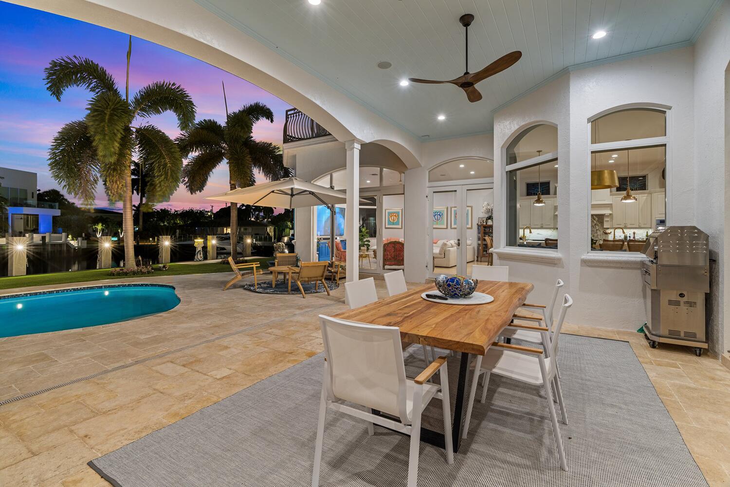 750 Northeast 37th Street Boca Raton, FL 33431 - Photo 40 of 50 a view of a table and chairs in a patio