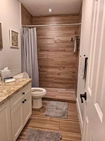 a view of a backyard with a garden