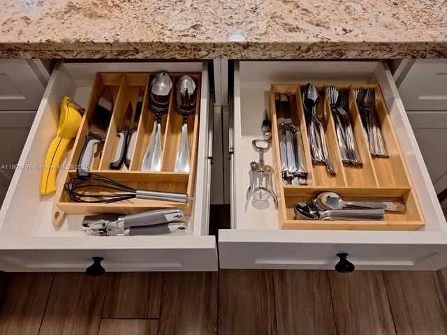 a view of backyard of house with green space